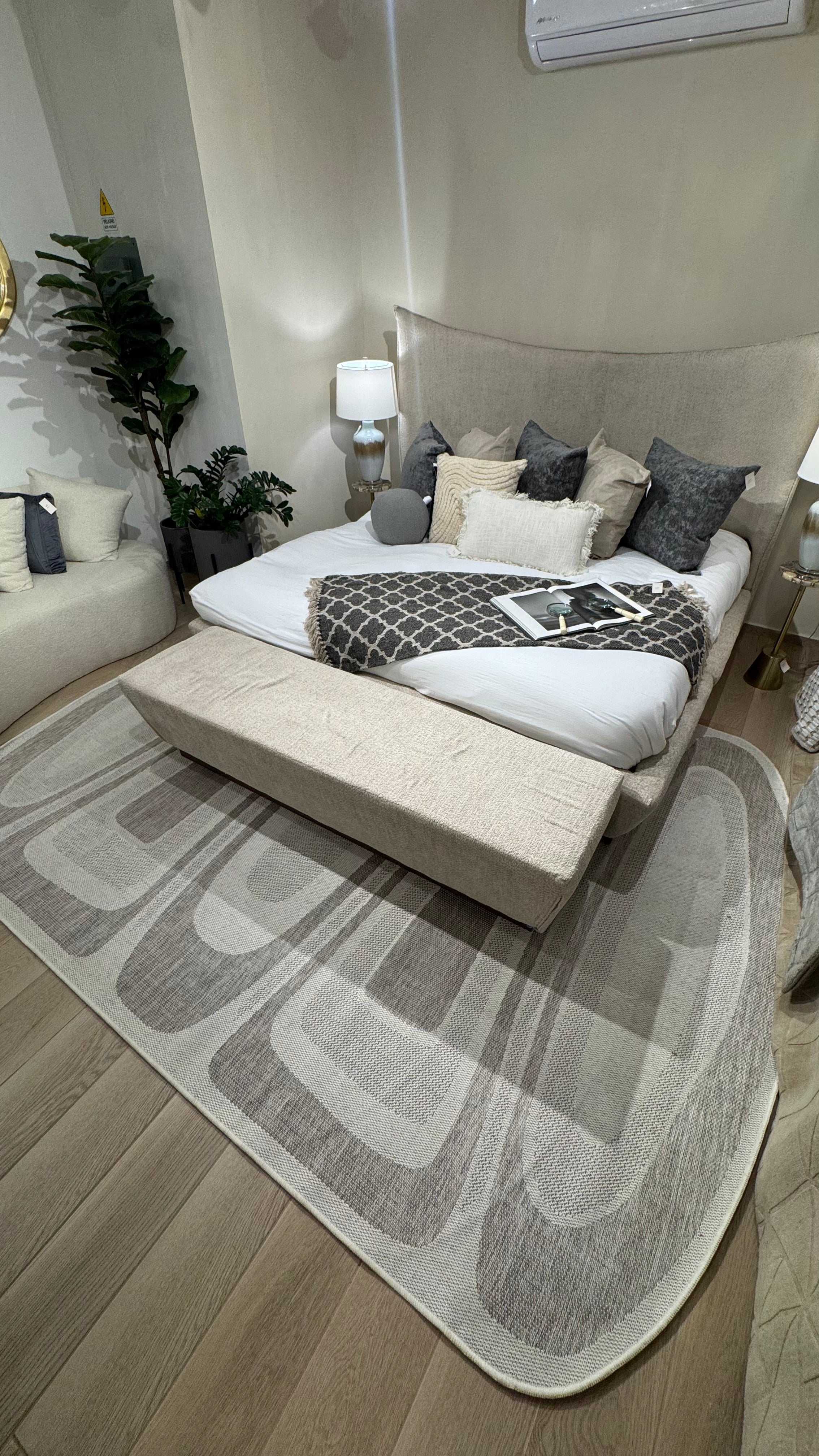 Two-Tone Sandy Beige Rug with Organic Live Edge Design.