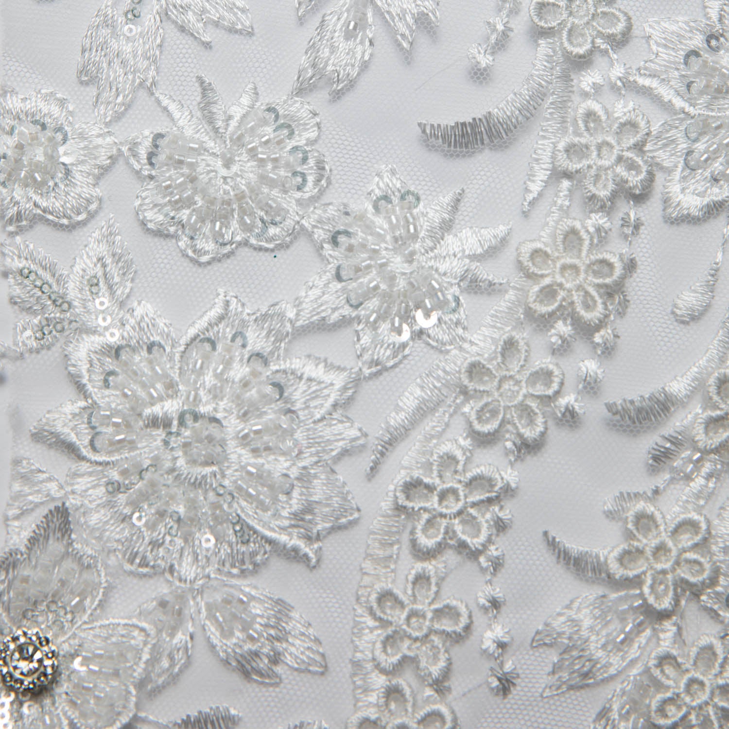 IVORY EMBROIDERED TULLE LACE WITH APPLIQUE WITH RICH INTRICATE 3D DESIGN 52" WIDE | Exquisite Fabric