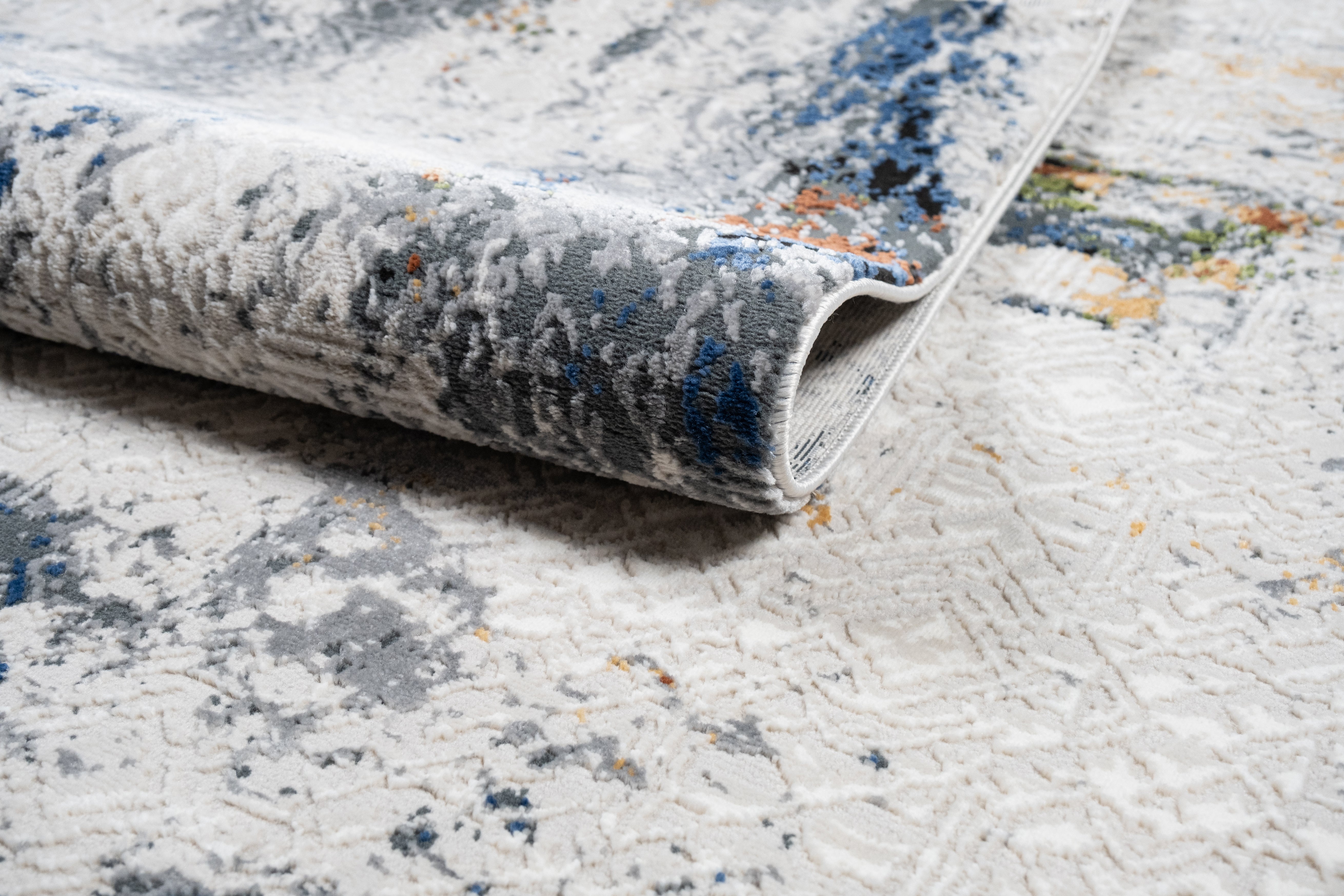 Cream Abstract Rug with Silver, Charcoal, Black, Red-Brown, Mustard, Ocean Blue & Green Accents.