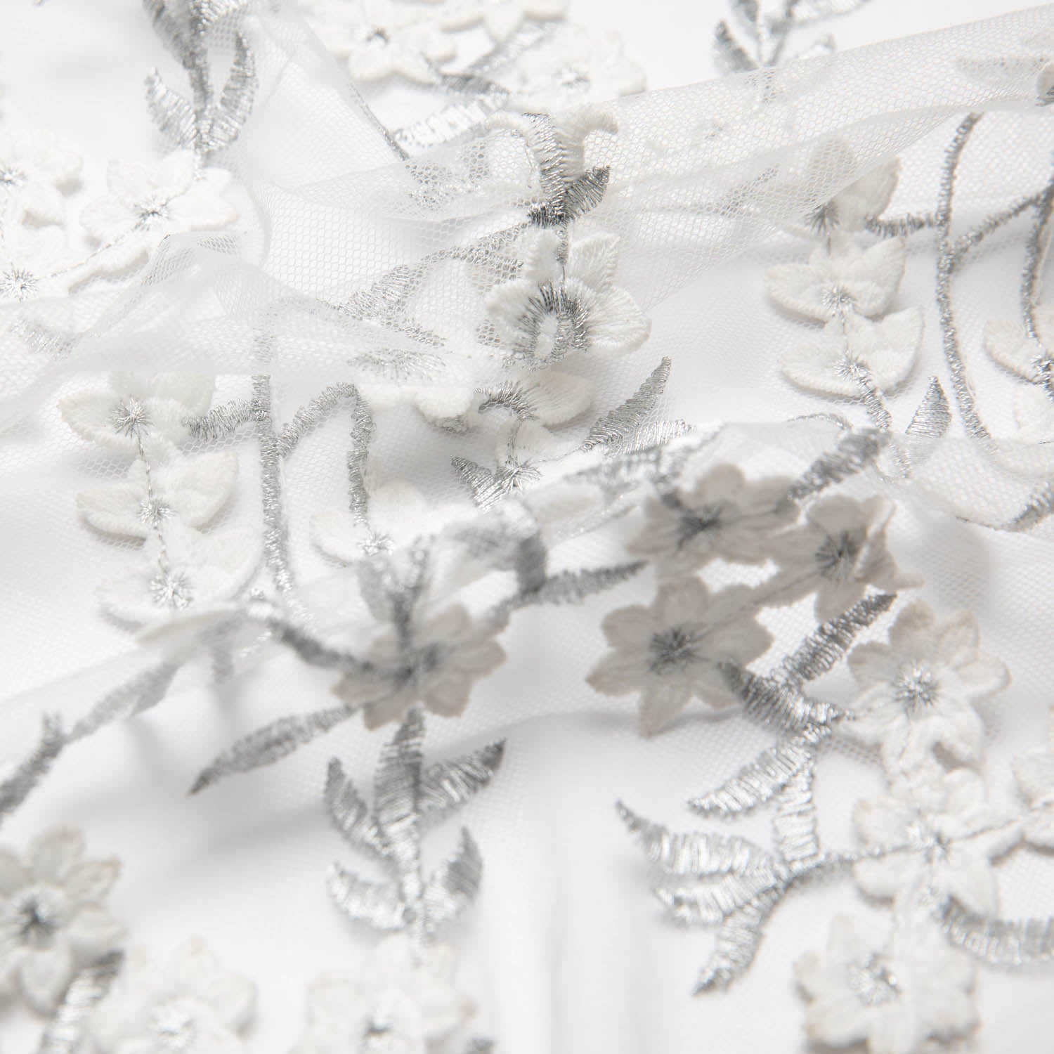 TULLE WITH EMB APPLIQUE 52/54" WHITE/SILVER FABRIC - Exquisite Fabrics