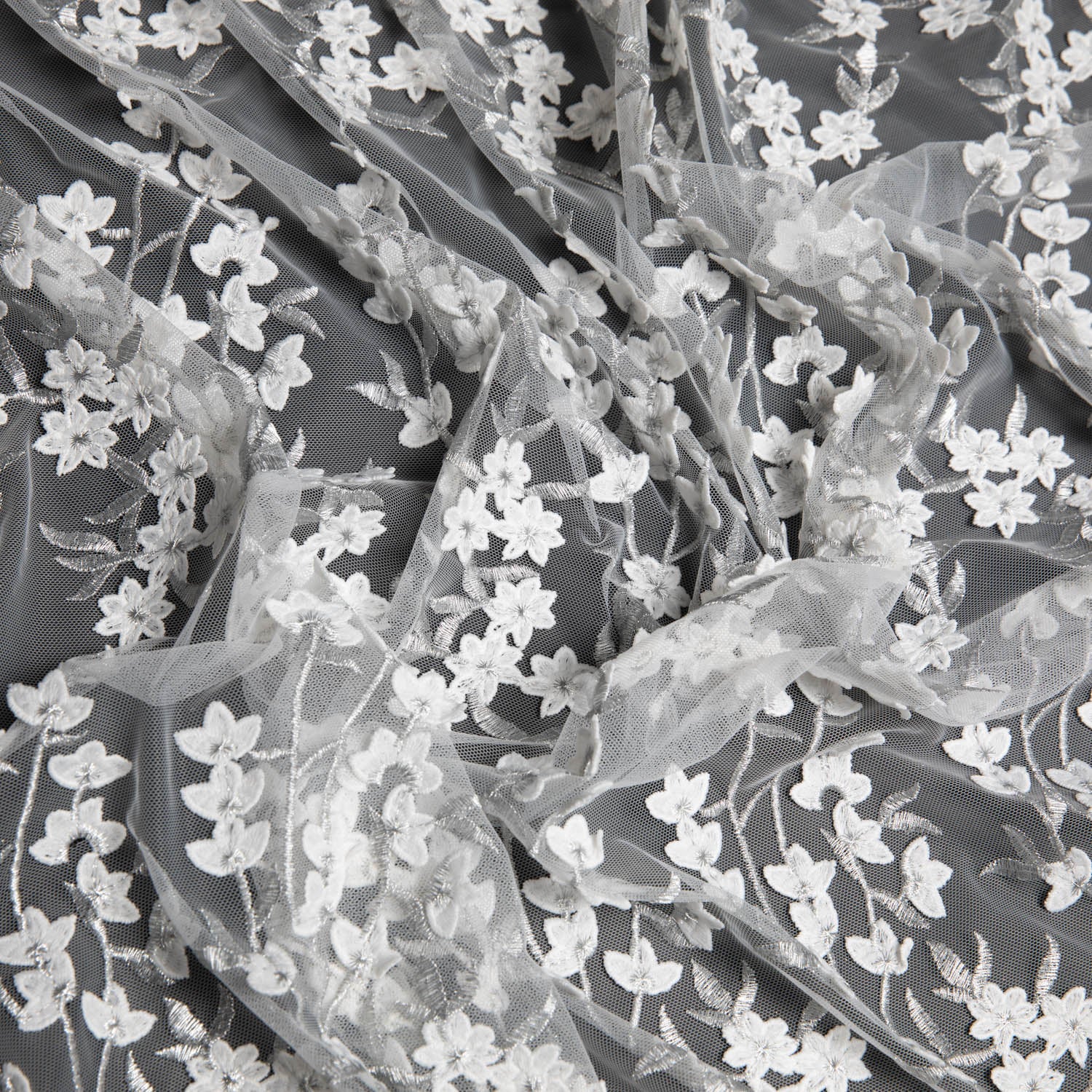 TULLE WITH EMB APPLIQUE 52/54" WHITE/SILVER FABRIC - Exquisite Fabrics