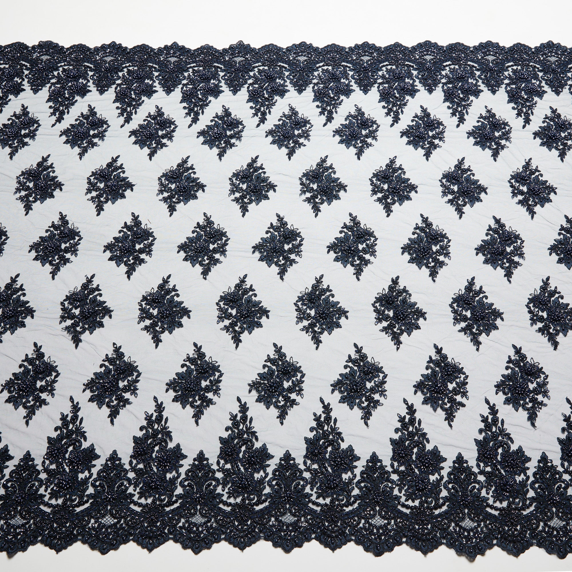 TULLE WITH EMB WITH BEADS AND SEQ 100% POLYESTER 50/52" DARK NAVY FABRIC - Exquisite Fabrics