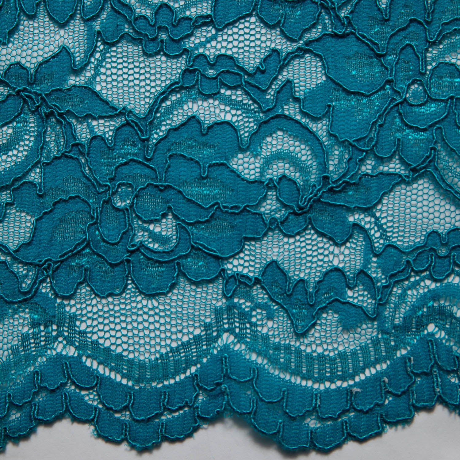 PEACOCK CORDED RASCHEL LACE FABRIC WITH ELEGANT FLORAL PATTERN 55% NYLON 45% COTTON  52/54" WIDE | Exquisite Fabric