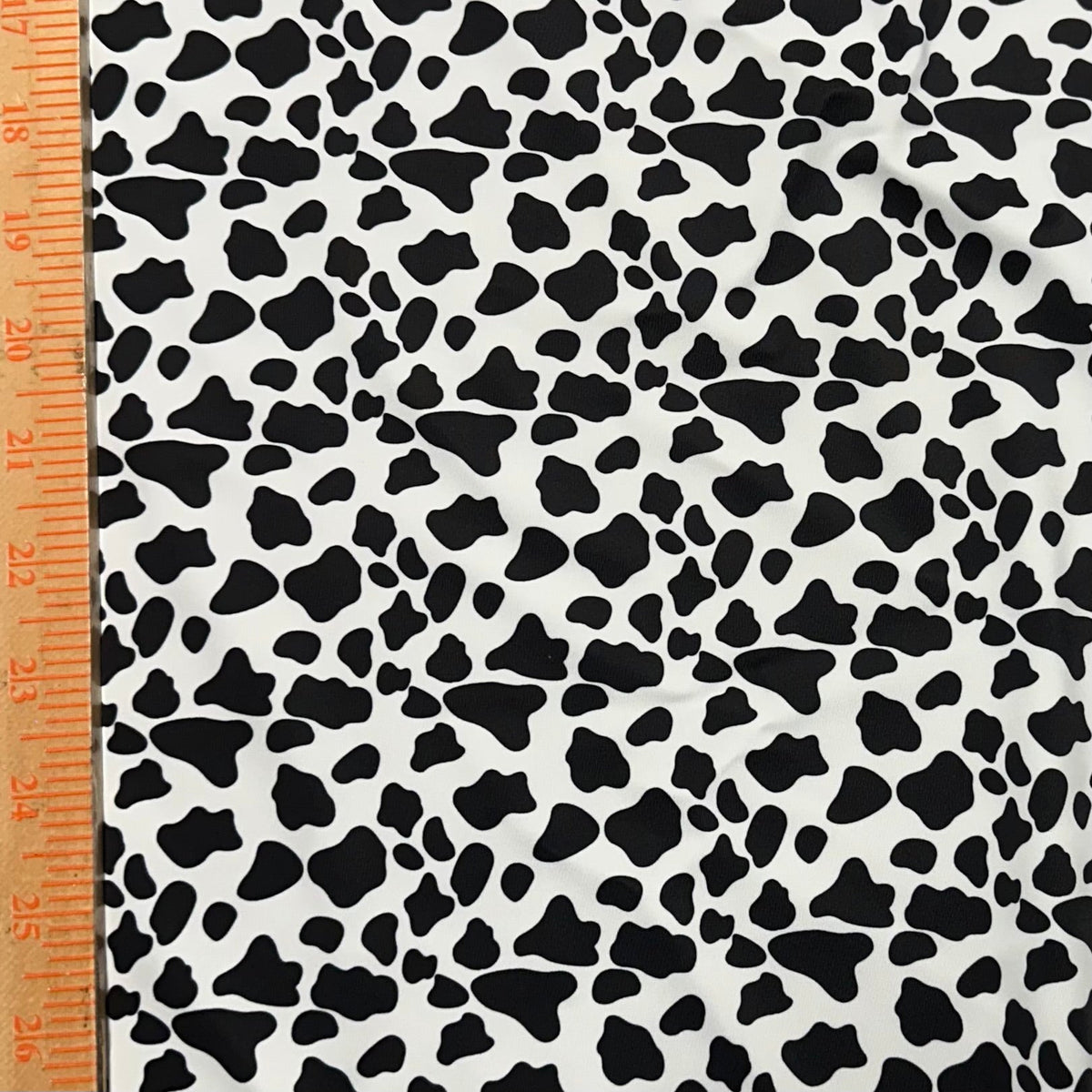 Poly Spandex Vibrant  Cow Print 4-Way Stretch Fabric | Spandex Palace