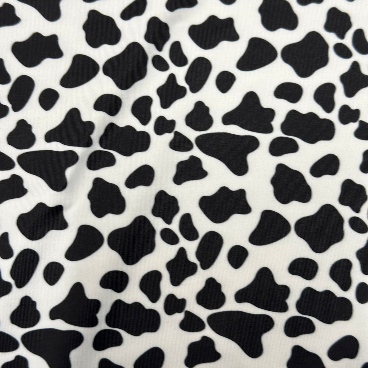 Poly Spandex Vibrant  Cow Print 4-Way Stretch Fabric | Spandex Palace