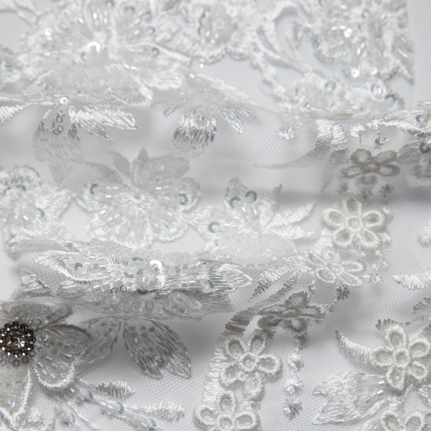 IVORY EMBROIDERED TULLE LACE WITH APPLIQUE WITH RICH INTRICATE 3D DESIGN 52" WIDE | Exquisite Fabric
