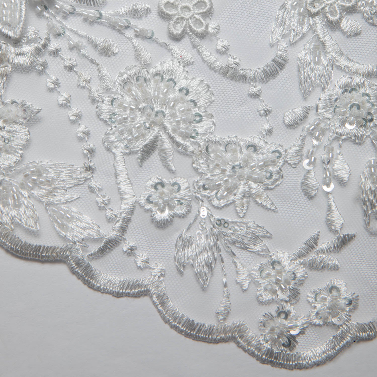 IVORY EMBROIDERED TULLE LACE WITH APPLIQUE WITH RICH INTRICATE 3D DESIGN 52" WIDE | Exquisite Fabric