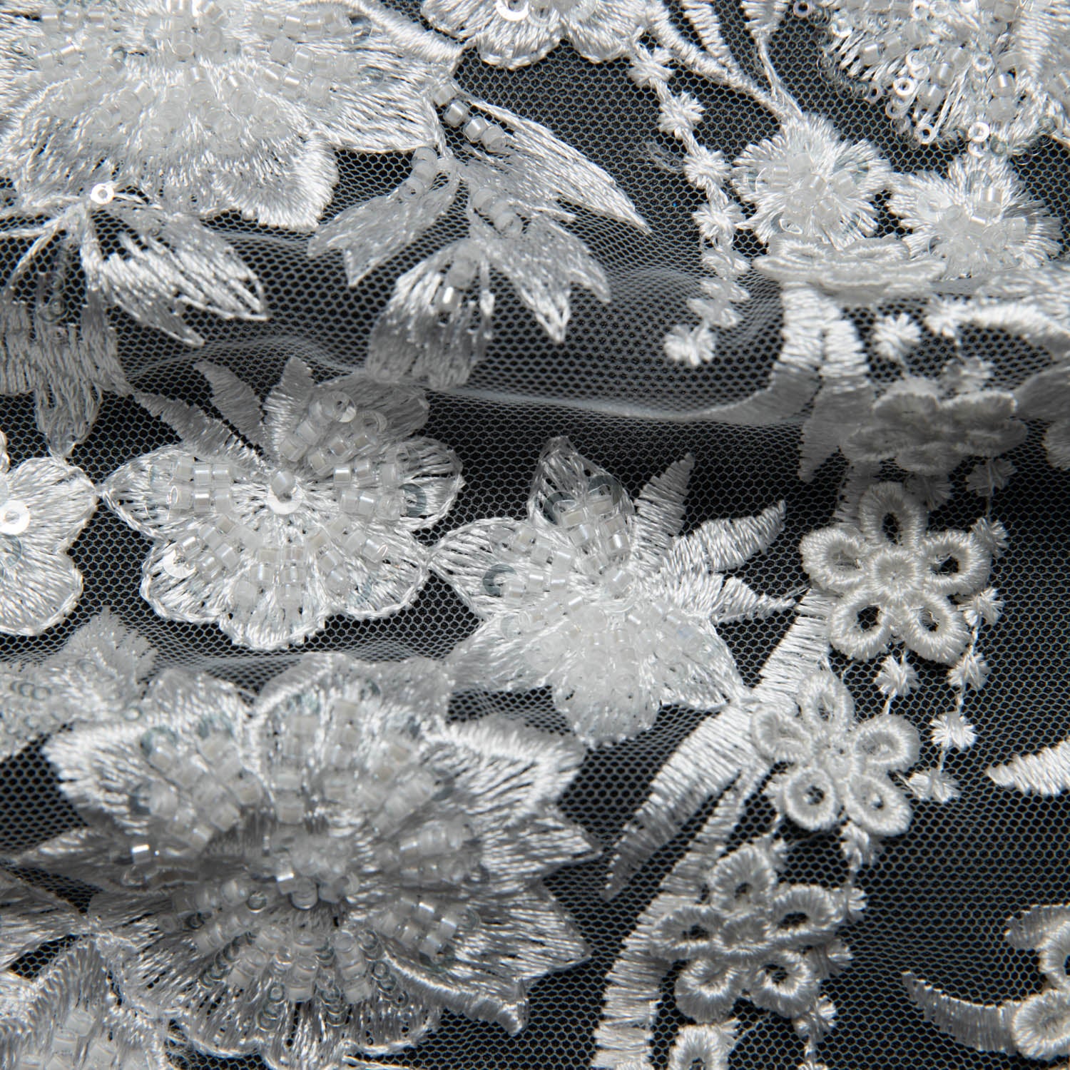 IVORY EMBROIDERED TULLE LACE WITH APPLIQUE WITH RICH INTRICATE 3D DESIGN 52" WIDE | Exquisite Fabric