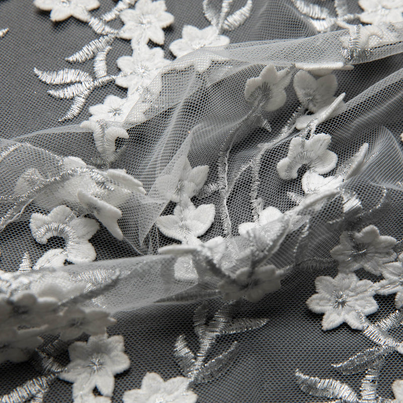 TULLE WITH EMB APPLIQUE 52/54" WHITE/SILVER FABRIC - Exquisite Fabrics