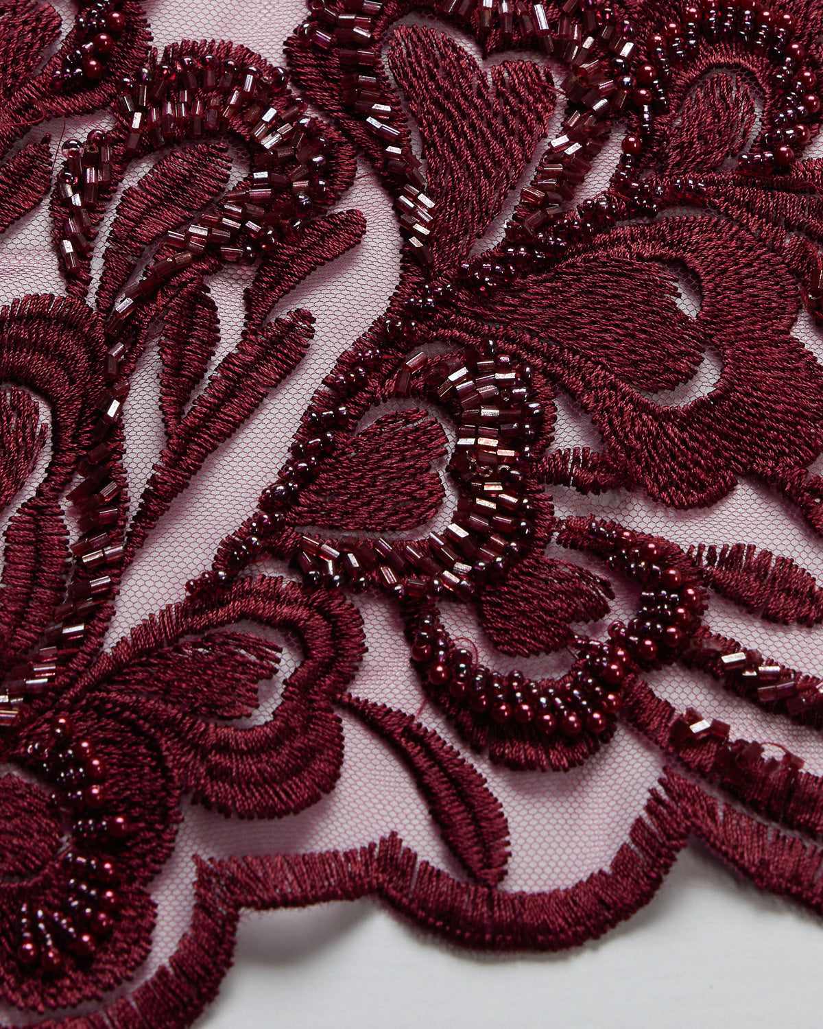 TULLE WITH EMB WITH BEADS AND SEQ 100% POLYESTER 50/52" BURGUNDY FABRIC - Exquisite Fabrics
