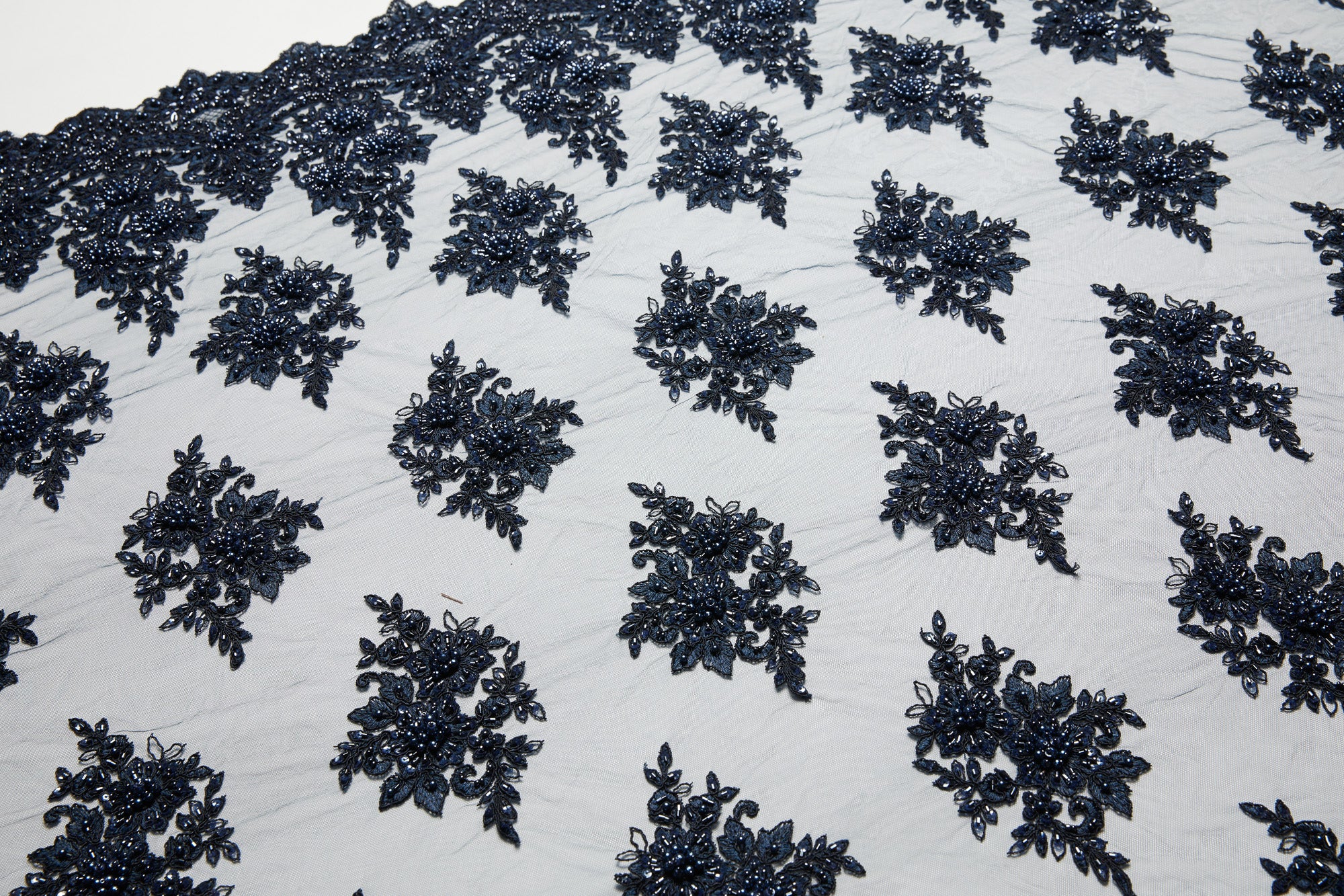 TULLE WITH EMB WITH BEADS AND SEQ 100% POLYESTER 50/52" DARK NAVY FABRIC - Exquisite Fabrics