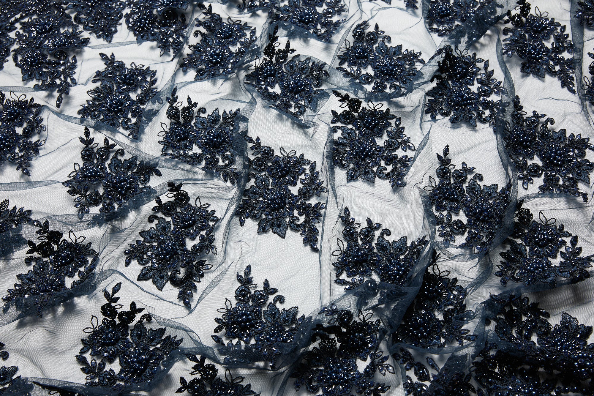 TULLE WITH EMB WITH BEADS AND SEQ 100% POLYESTER 50/52" DARK NAVY FABRIC - Exquisite Fabrics