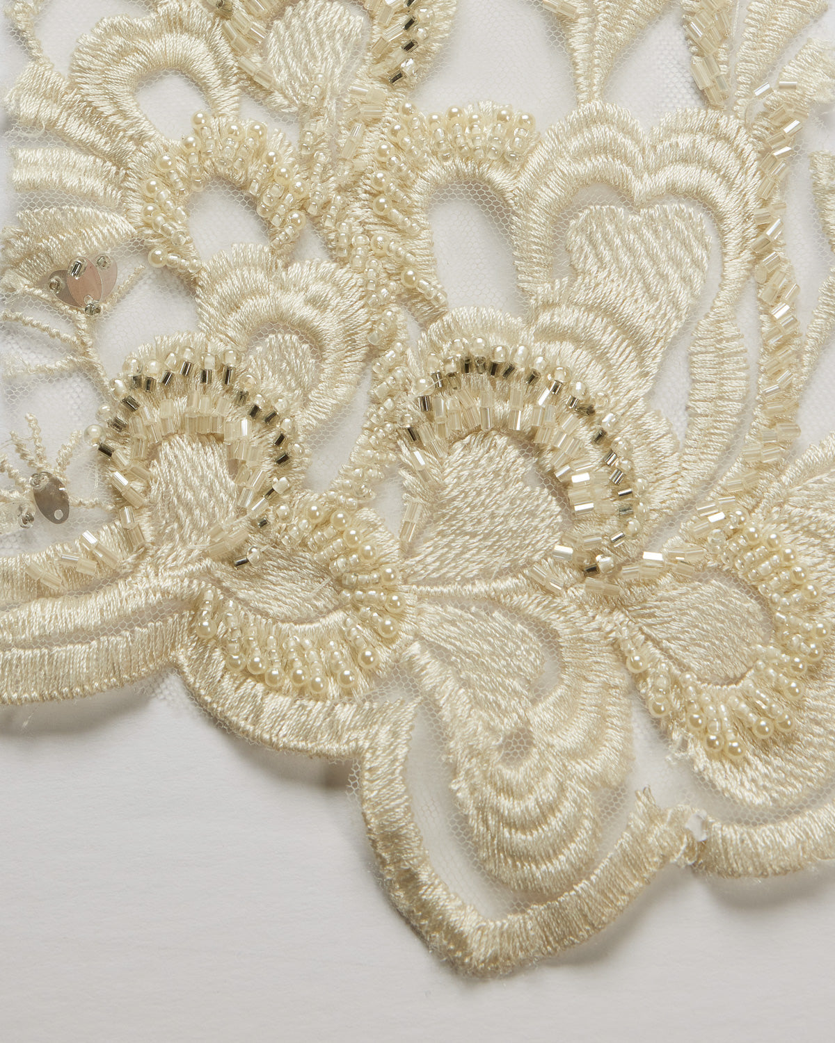 TULLE WITH EMB WITH BEADS AND SEQ 100% POLYESTER 50/52" IVORY FABRIC - Exquisite Fabrics